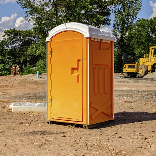 what is the cost difference between standard and deluxe portable restroom rentals in Byron